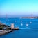 The mouth of the Tagus River including the 25 de Abril Bridge, Belém Tower and sailboats on the water